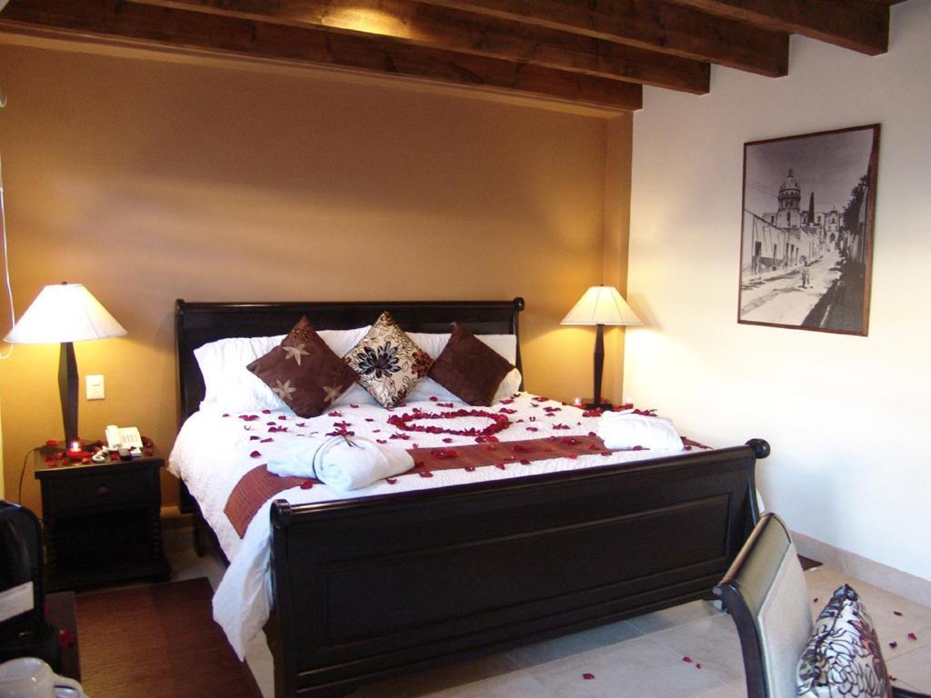 Casa Del Tio Hotel Boutique San Miguel de Allende Room photo A bedroom at the Inn at the Quinta Real